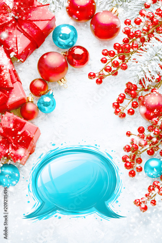 Colorful winter decorations with presents and ornaments during the holiday season on a snowy background