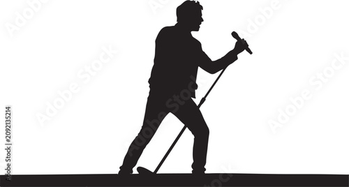 Silhouette of a male vocalist or rock star singing into a microphone on a stand during a live concert music performance