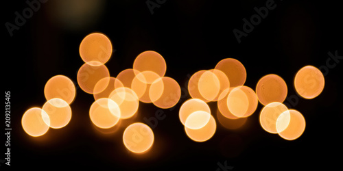 Glowing orange spheres against dark background