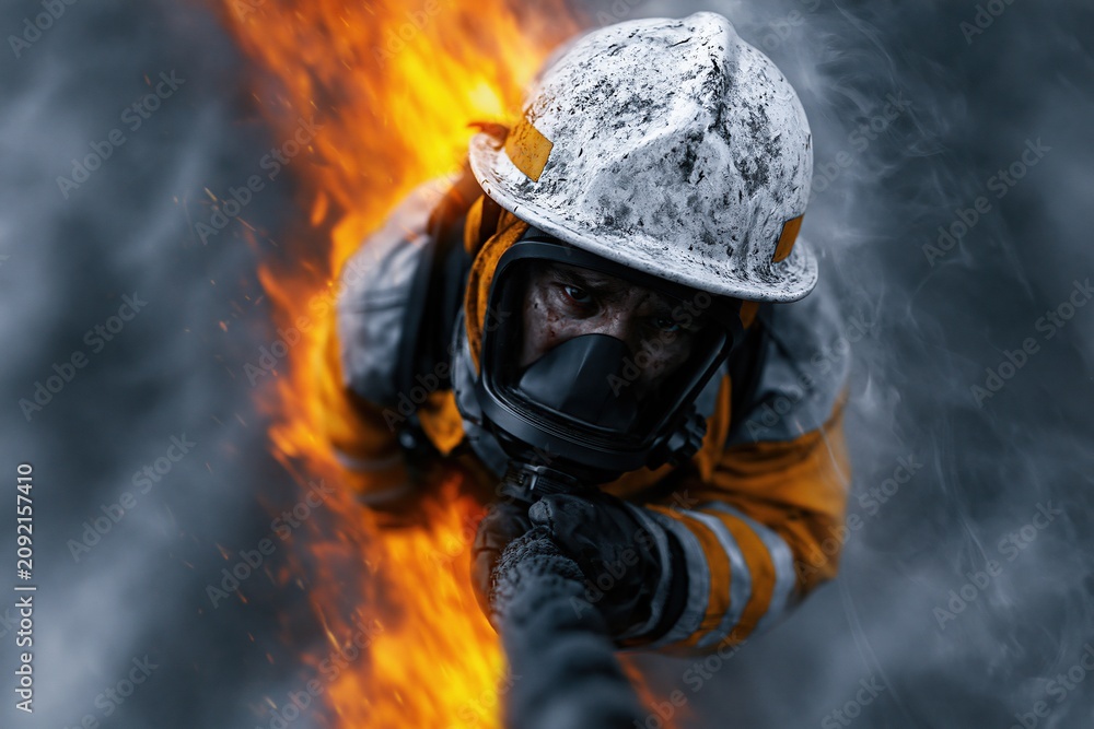 Obraz premium Firefighter climbs rope to rescue person from flames and smoke at a fire scene in a city during daytime