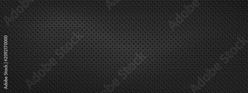 Foto Dark perforated metal texture with black carbon fiber and micro holes