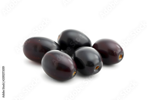 Close-up of five black oliv...