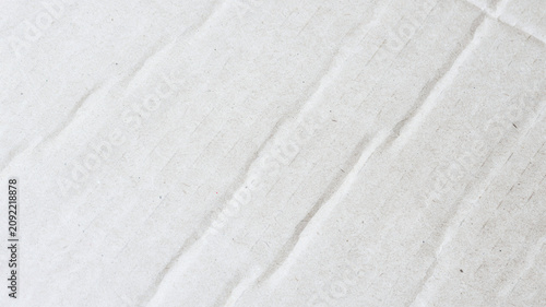 Foto Close up of overlapping white plasterboard sheets with smooth textured finish in
