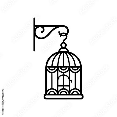 Принти на полотні Birdcage hanging from metal bracket.