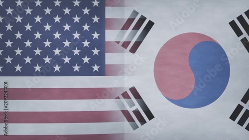 Midway tearing US and South Korea flags separating center seam in studio, revealing dark gap