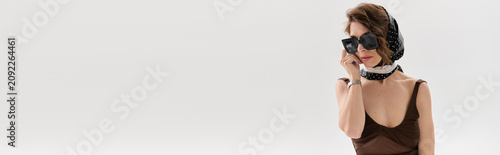 Принти на полотні Elegant woman exuding charm in chic attire and stylish accessories