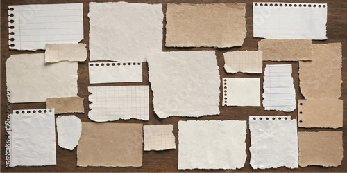 Assorted Torn Paper Pieces and Kraft Notes Collage Layout on Brown Wooden Texture Backgrounds