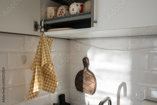 Obraz na plátne A kitchen towel hangs on a dish rack.