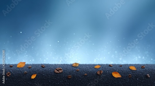 Scattered coffee beans and golden leaves create a serene path under a soft blue light