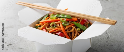 Tasty Noodles with Colorful Vegetables in Takeout Box Perfect for Asian Cuisine, Restaurant, and Food Photography, Ideal for Culinary Promotion Projects