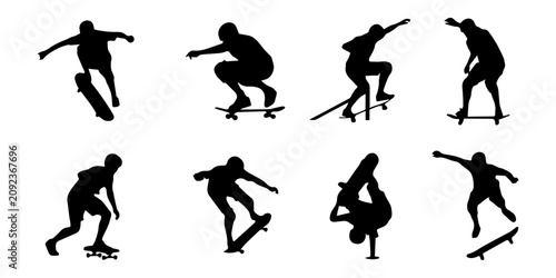 Canvastavla Dynamic silhouettes of urban skateboarders capture different mid-air tricks and poses on skateboards against a clean white background