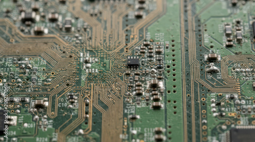 Close up of a complex electronic circuit board with many components 10.