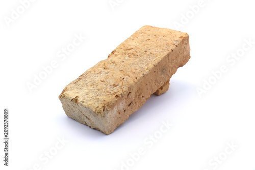 Solid clay bricks used for construction.Old red brick isolated on white background.