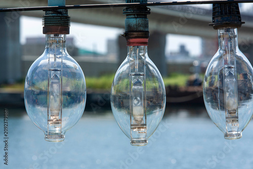 Foto Vintage fishing vessel lighting with clear glass bulbs illuminating night operat
