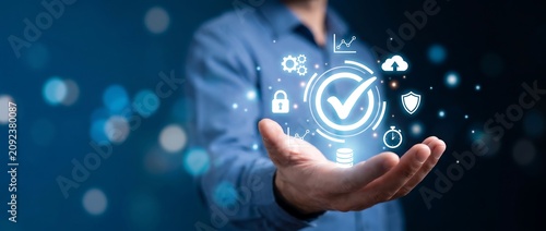 Business professional presenting approval verification concept with digital checkmark for compliance, quality assurance and secure business process