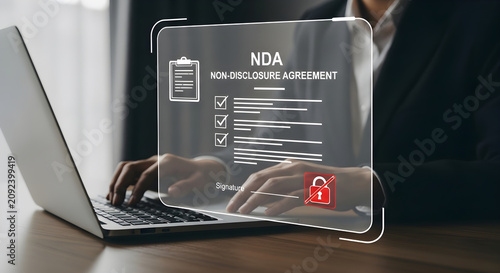 Professional Business Person Signing Digital Non-Disclosure Agreement on Secure Laptop Interface