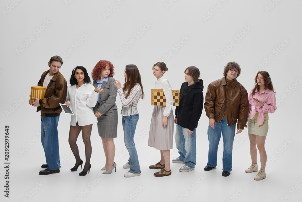 Obraz premium People waiting in line for online order pickup and click and collect service. Concept of ecommerce fulfillment, parcel collection, omnichannel retail, customer convenience and last mile logistics.