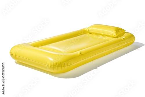 Yellow Inflatable Lounger with Pillow, Floating on Water