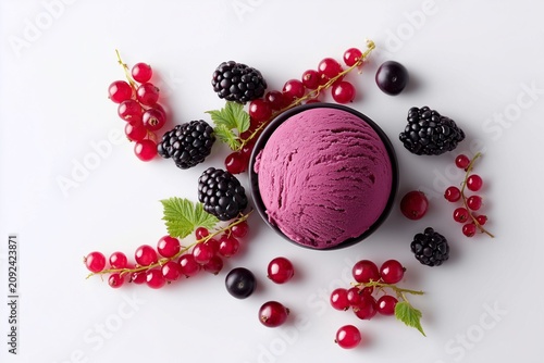 Mixed Berry Ice Cream Scoop with Blackberries and Redcurrants on White Background.