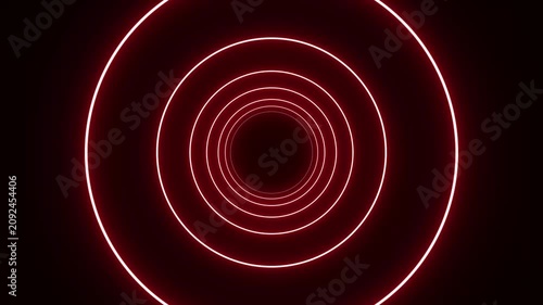 Glowing pink neon circles pulsing in the dark abstract technology background with concentric rings