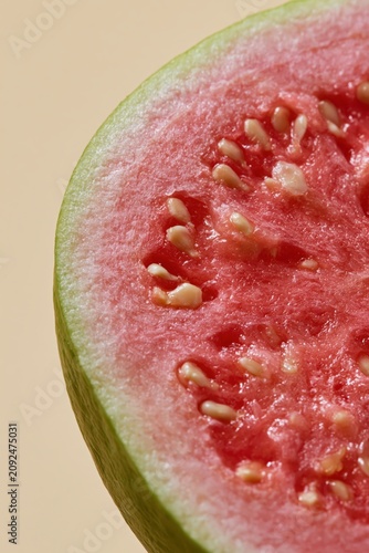 Guava Whole Green Yellow Exterior Macro Close Up Coral Background Vertical Studio