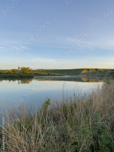 Scenic river landscape at sunrise in Wyndham Carseland Provincial Park Alberta