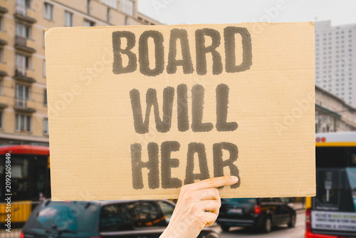 Photography "Board Will Hear" Governance dispute reaches district level