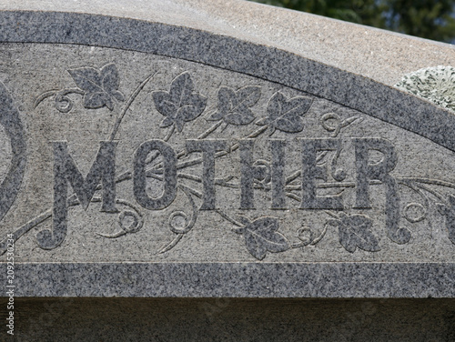 Close up of Historic Headstone With Word Mother