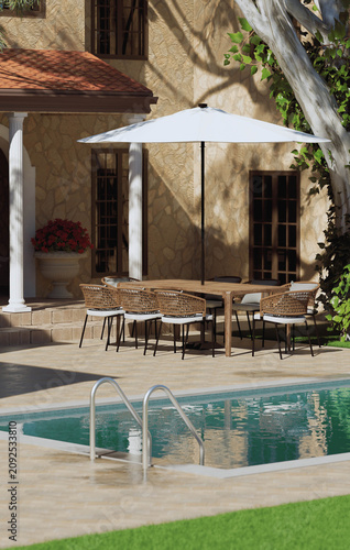 Luxury Mediterranean villa patio with outdoor dining table and swimming pool