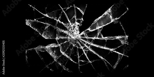 Shattered glass crack pattern isolated on black background, broken window texture with spiderweb fracture lines, abstract damage effect for design, impact and destruction concept