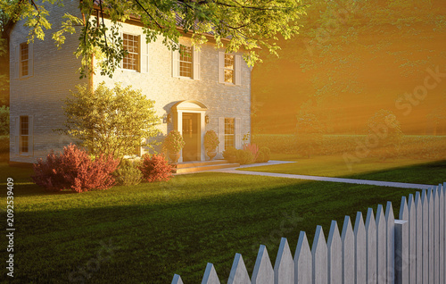 Classic Two-Story House with White Fence at Golden Sunset