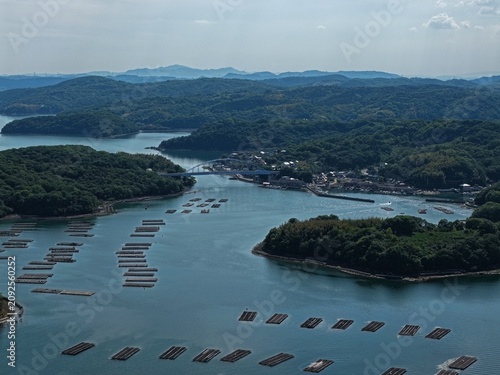 Sticker Aerial drone photo of oyster farming rafts and islands in Mushiake, Setouchi, Ja