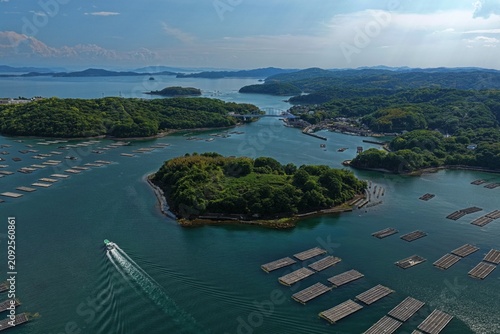 Aerial drone photo of oyster rafts and islands in Mushiage, Setouchi, Okayama, Japan
