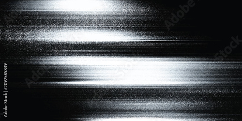 Cuadro en lienzo Blurry white light streaks on dark textured surface with grainy effect abstract