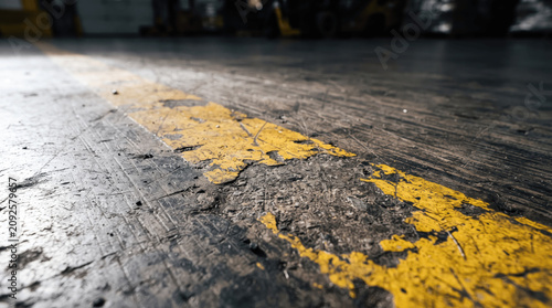 Floor features yellow stripes.