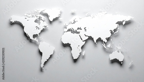 White three‑dimensional world map with raised continents casting subtle shadows on light gray background, accurately shaped outlines of Africa, Europe, Asia, North and South America, and Australia, mi