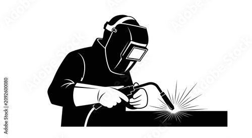 Foto Welder with protective mask and torch black silhouette welding fabricator crafts