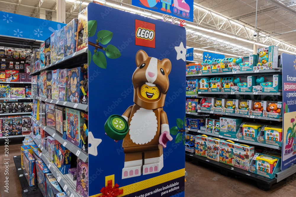 Fototapeta premium Lego advertisement featuring a character, by The Lego Group, on toy aisle racks at a supermarket. Jalisco, Mexico, July 20, 2026.