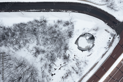 Snow Covered Corner Pond, Roads and Trees From Above