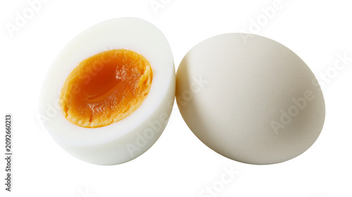 Vászonkép Whole and halved hard-boiled eggs with soft orange yolk, isolated on transparent