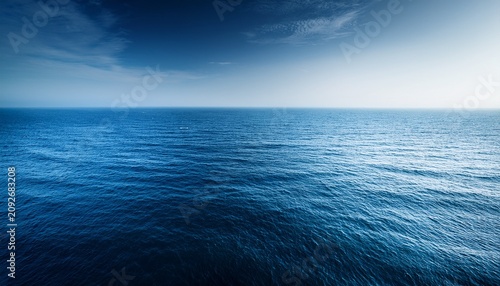 A Perfectly Smooth Deep Blue Ocean Surface Under Muted Light Conveying Immense Stillness And Quiet Meditative Reflection Deepness Meditative Nature