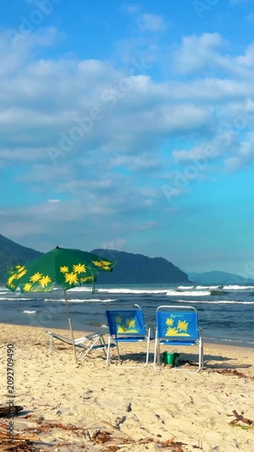 beach with umbrellas and chairs