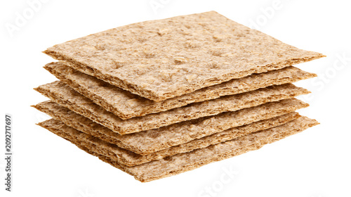Stack of crispbread crackers with textured surface, isolated on transparent background