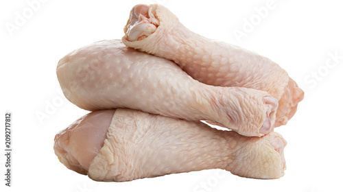 Three raw chicken drumsticks stacked, isolated on transparent background
