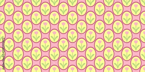 Фотография Pretty red tulips enclosed in warm yellow ovals over a soft bubblegum pink canvas