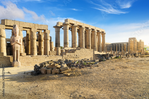 Obraz na płótnie The Colonnade of Amenhotep III with it's 14 column gallery of papyrus pillars, and the Peristyle Sun Court in the distance at the ancient Luxor Temple, Luxor, Egypt