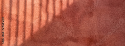 Cuadro en lienzo Close-up of textured, warm-toned surface with subtle shadows and lines creating an abstract design