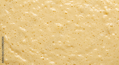 Close-up of Bubbly Batter Texture, Macro Shot of Food Preparation