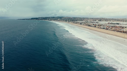 Wide aerial panorama of Pacific Beach coastline in San Diego California with ocean shoreline and coastal neighborhoods