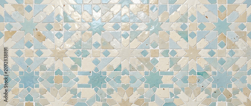 Fotografie Moroccan mosaic tile texture featuring geometric blue and cream glazed ceramic p